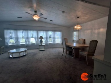 Corner Lot Gem with Golf Course Views in Rolling Greens Village! on Rolling Greens Executive Golf Community in Florida - for sale on GolfHomes.com, golf home, golf lot