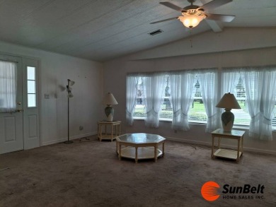 Corner Lot Gem with Golf Course Views in Rolling Greens Village! on Rolling Greens Executive Golf Community in Florida - for sale on GolfHomes.com, golf home, golf lot
