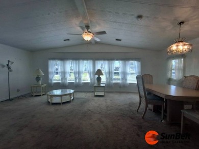 Corner Lot Gem with Golf Course Views in Rolling Greens Village! on Rolling Greens Executive Golf Community in Florida - for sale on GolfHomes.com, golf home, golf lot