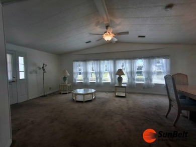 Corner Lot Gem with Golf Course Views in Rolling Greens Village! on Rolling Greens Executive Golf Community in Florida - for sale on GolfHomes.com, golf home, golf lot