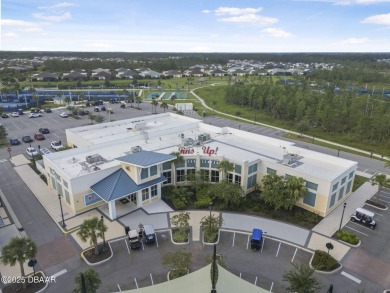 Cute Cottage by the Blue Guitar Park - Margaritaville Magic on LPGA International Golf Course in Florida - for sale on GolfHomes.com, golf home, golf lot