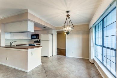 Fall in love with this spacious 2-bedroom, 2-bathroom condo four on Stevens Park Golf Course in Texas - for sale on GolfHomes.com, golf home, golf lot