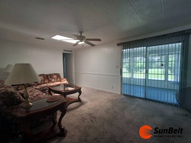 Corner Lot Gem with Golf Course Views in Rolling Greens Village! on Rolling Greens Executive Golf Community in Florida - for sale on GolfHomes.com, golf home, golf lot