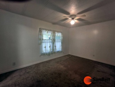 Corner Lot Gem with Golf Course Views in Rolling Greens Village! on Rolling Greens Executive Golf Community in Florida - for sale on GolfHomes.com, golf home, golf lot