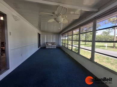 Corner Lot Gem with Golf Course Views in Rolling Greens Village! on Rolling Greens Executive Golf Community in Florida - for sale on GolfHomes.com, golf home, golf lot