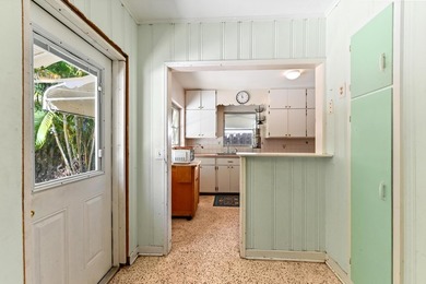 Single-family home located in the Historic District of Lake on Lake Worth Municipal Golf Course in Florida - for sale on GolfHomes.com, golf home, golf lot