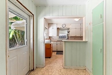 Single-family home located in the Historic District of Lake on Lake Worth Municipal Golf Course in Florida - for sale on GolfHomes.com, golf home, golf lot