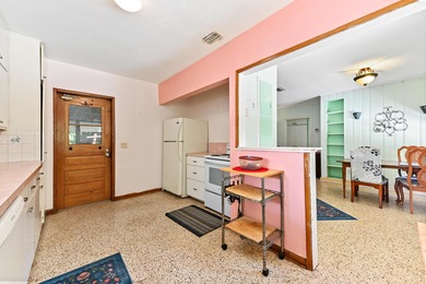 Single-family home located in the Historic District of Lake on Lake Worth Municipal Golf Course in Florida - for sale on GolfHomes.com, golf home, golf lot