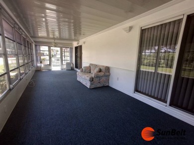 Corner Lot Gem with Golf Course Views in Rolling Greens Village! on Rolling Greens Executive Golf Community in Florida - for sale on GolfHomes.com, golf home, golf lot