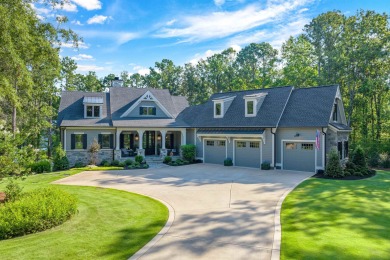 A LUXURY HOME FOR YOU AWAITS!  Discover the epitome of luxury on Great Waters Course At Reynolds Plantation in Georgia - for sale on GolfHomes.com, golf home, golf lot