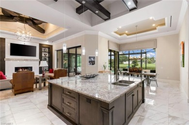 Experience the pinnacle of Florida luxury living in this on Quail West Golf and Country Club in Florida - for sale on GolfHomes.com, golf home, golf lot