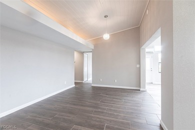 Located at 16737 Pheasant Court on a quiet cul-de-sac within the on The Forest Country Club in Florida - for sale on GolfHomes.com, golf home, golf lot