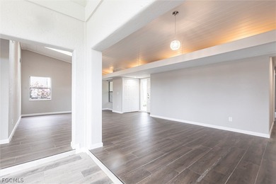 Located at 16737 Pheasant Court on a quiet cul-de-sac within the on The Forest Country Club in Florida - for sale on GolfHomes.com, golf home, golf lot