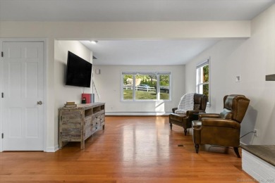 Prepare to be impressed! This stunning 4-bedroom, 2 full and 2 on  in Connecticut - for sale on GolfHomes.com, golf home, golf lot