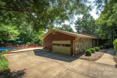 You've found your Mid-Century Modern Oasis! This single-level on Black Mountain Golf Course in North Carolina - for sale on GolfHomes.com, golf home, golf lot