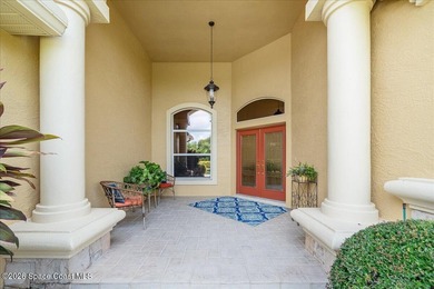 Tucked away on a private cul-de-sac in the gated subdivision of on Baytree National Golf Links in Florida - for sale on GolfHomes.com, golf home, golf lot