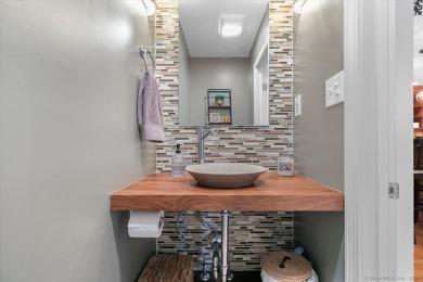 Prepare to be impressed! This stunning 4-bedroom, 2 full and 2 on  in Connecticut - for sale on GolfHomes.com, golf home, golf lot