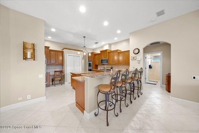 Tucked away on a private cul-de-sac in the gated subdivision of on Baytree National Golf Links in Florida - for sale on GolfHomes.com, golf home, golf lot