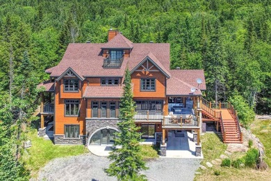 Acces to Lake Ouimet! The home greets you with its beautifully on Le Diable Golf Course in  - for sale on GolfHomes.com, golf home, golf lot