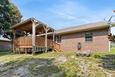 You'll blend with nature in this all brick, 3-bedroom, 2-bath on The Club At Hidden Creek in Florida - for sale on GolfHomes.com, golf home, golf lot