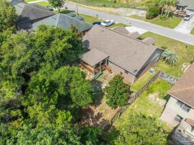You'll blend with nature in this all brick, 3-bedroom, 2-bath on The Club At Hidden Creek in Florida - for sale on GolfHomes.com, golf home, golf lot