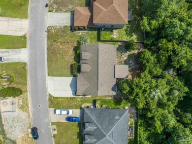 You'll blend with nature in this all brick, 3-bedroom, 2-bath on The Club At Hidden Creek in Florida - for sale on GolfHomes.com, golf home, golf lot