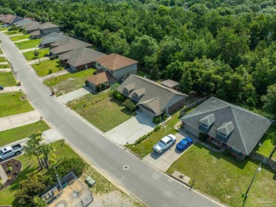 You'll blend with nature in this all brick, 3-bedroom, 2-bath on The Club At Hidden Creek in Florida - for sale on GolfHomes.com, golf home, golf lot