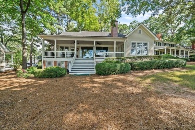 BEST VIEW GREAT WATERS MARINE COTTAGE SOLD on Great Waters Course At Reynolds Plantation in Georgia - for sale on GolfHomes.com, golf home, golf lot