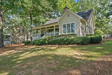 BEST VIEW GREAT WATERS MARINE COTTAGE SOLD on Great Waters Course At Reynolds Plantation in Georgia - for sale on GolfHomes.com, golf home, golf lot