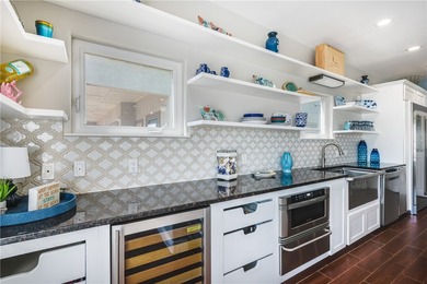 Stunning Waterfront Home on the Desirable Shady Side of Island on Palmilla Beach Golf Club in Texas - for sale on GolfHomes.com, golf home, golf lot