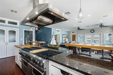 Stunning Waterfront Home on the Desirable Shady Side of Island on Palmilla Beach Golf Club in Texas - for sale on GolfHomes.com, golf home, golf lot