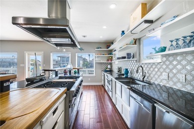 Stunning Waterfront Home on the Desirable Shady Side of Island on Palmilla Beach Golf Club in Texas - for sale on GolfHomes.com, golf home, golf lot