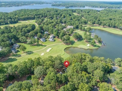 BEST VIEW GREAT WATERS MARINE COTTAGE SOLD on Great Waters Course At Reynolds Plantation in Georgia - for sale on GolfHomes.com, golf home, golf lot