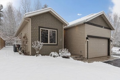 This open-concept 2-bedroom, 2.5-bathroom single-level townhouse on Meadow Lake Golf Resort in Montana - for sale on GolfHomes.com, golf home, golf lot