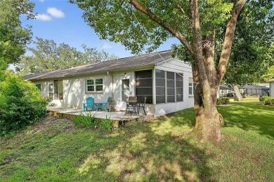 Discover low-maintenance Florida living in this beautifully on Seven Springs Golf and Country Club in Florida - for sale on GolfHomes.com, golf home, golf lot