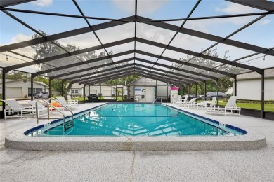 Discover low-maintenance Florida living in this beautifully on Seven Springs Golf and Country Club in Florida - for sale on GolfHomes.com, golf home, golf lot