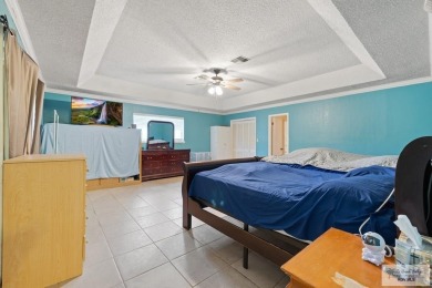 Remarkable opportunity to own a spacious 3,728 sq ft home with on Rancho Viejo Resort and Country Club in Texas - for sale on GolfHomes.com, golf home, golf lot
