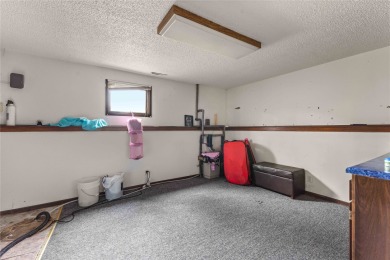Discover your dream home in this stunning 4 bed / 3 bath retreat on Tama Toledo Country Club in Iowa - for sale on GolfHomes.com, golf home, golf lot
