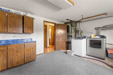 Discover your dream home in this stunning 4 bed / 3 bath retreat on Tama Toledo Country Club in Iowa - for sale on GolfHomes.com, golf home, golf lot