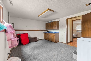 Discover your dream home in this stunning 4 bed / 3 bath retreat on Tama Toledo Country Club in Iowa - for sale on GolfHomes.com, golf home, golf lot