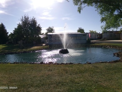 Welcome to Juniper Ridge, a highly sought-after 55+ gated on Juniper Ridge R.V. Golf Resort in Arizona - for sale on GolfHomes.com, golf home, golf lot