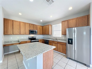 Welcome to this beautifully refreshed 4-bedroom, 3-bath on Eagle Dunes Golf Club in Florida - for sale on GolfHomes.com, golf home, golf lot