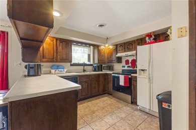 Discover your dream home in this stunning 4 bed / 3 bath retreat on Tama Toledo Country Club in Iowa - for sale on GolfHomes.com, golf home, golf lot