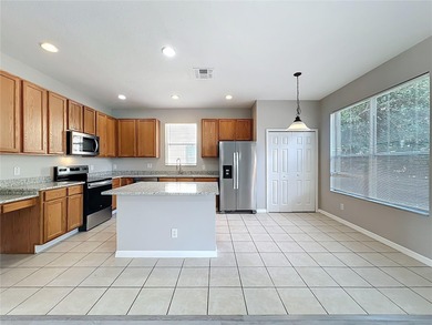 Welcome to this beautifully refreshed 4-bedroom, 3-bath on Eagle Dunes Golf Club in Florida - for sale on GolfHomes.com, golf home, golf lot