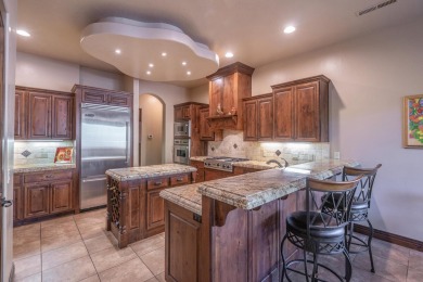 Experience luxurious living in this exquisite AJ Construction on Entrada at Snow Canyon in Utah - for sale on GolfHomes.com, golf home, golf lot