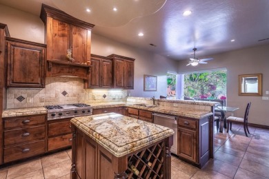 Experience luxurious living in this exquisite AJ Construction on Entrada at Snow Canyon in Utah - for sale on GolfHomes.com, golf home, golf lot
