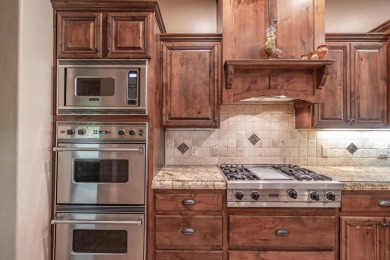 Experience luxurious living in this exquisite AJ Construction on Entrada at Snow Canyon in Utah - for sale on GolfHomes.com, golf home, golf lot