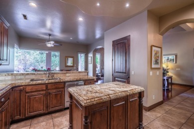 Experience luxurious living in this exquisite AJ Construction on Entrada at Snow Canyon in Utah - for sale on GolfHomes.com, golf home, golf lot