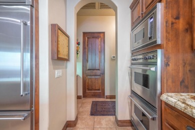Experience luxurious living in this exquisite AJ Construction on Entrada at Snow Canyon in Utah - for sale on GolfHomes.com, golf home, golf lot