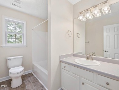 Beautifully updated 3-bedroom, 2.5-bath home in the highly on Hedingham Golf and Athletic Club in North Carolina - for sale on GolfHomes.com, golf home, golf lot